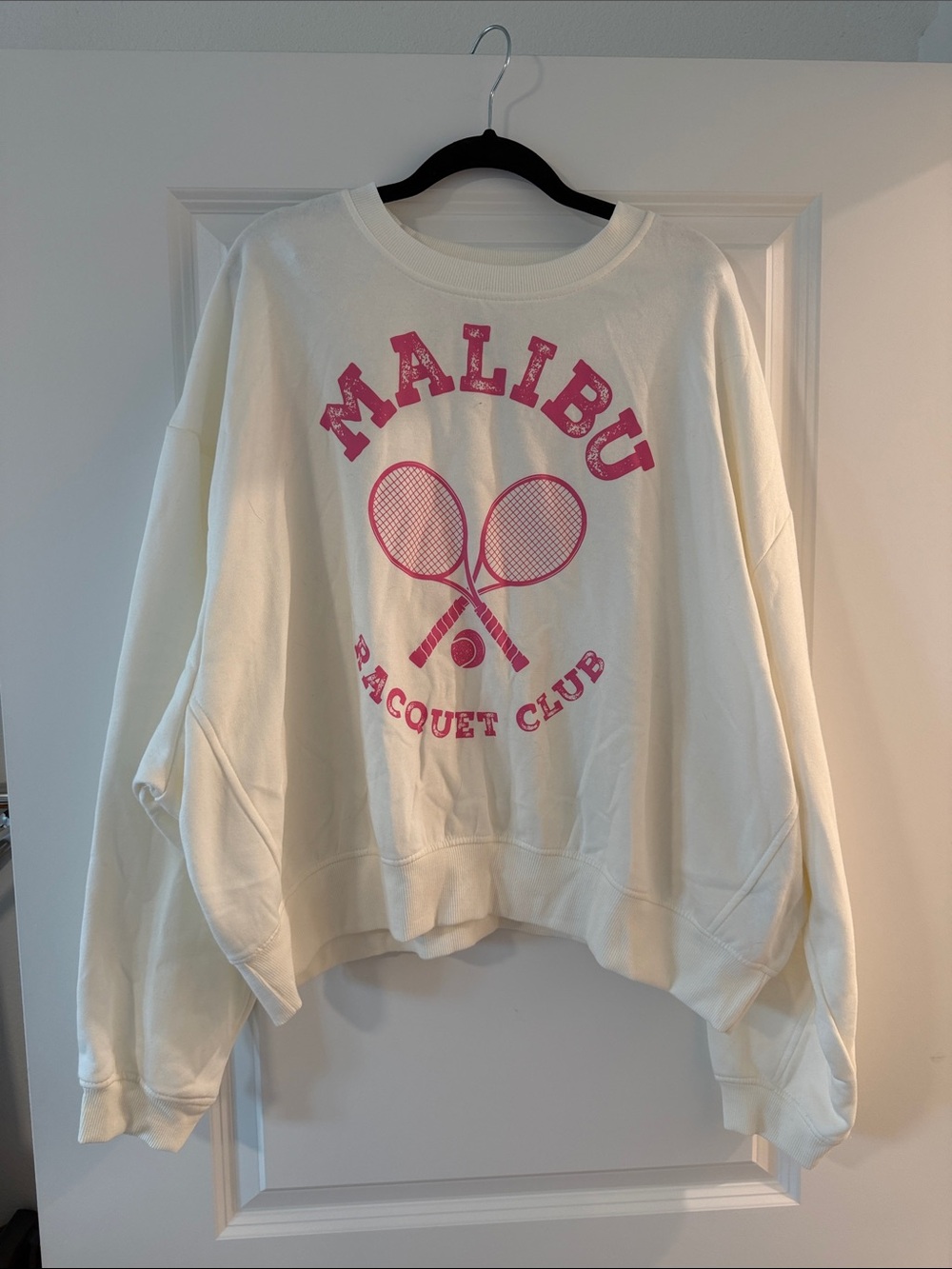 No Boundaries Cream Crewneck Sweatshirt with Pink Tennis Graphic